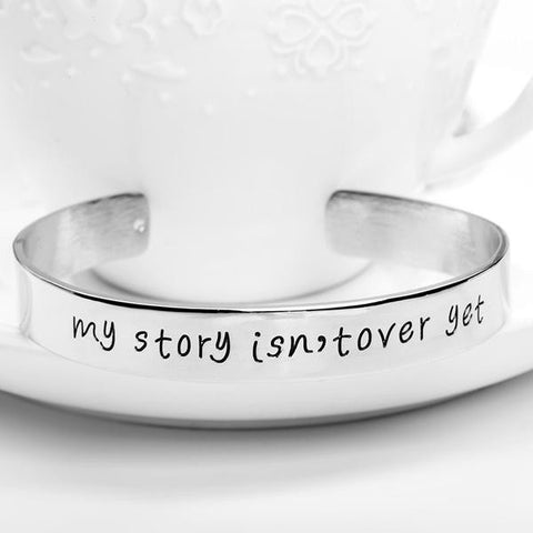 Image of My Story Isnt Over Yet Engraved Bangle - mamyfull